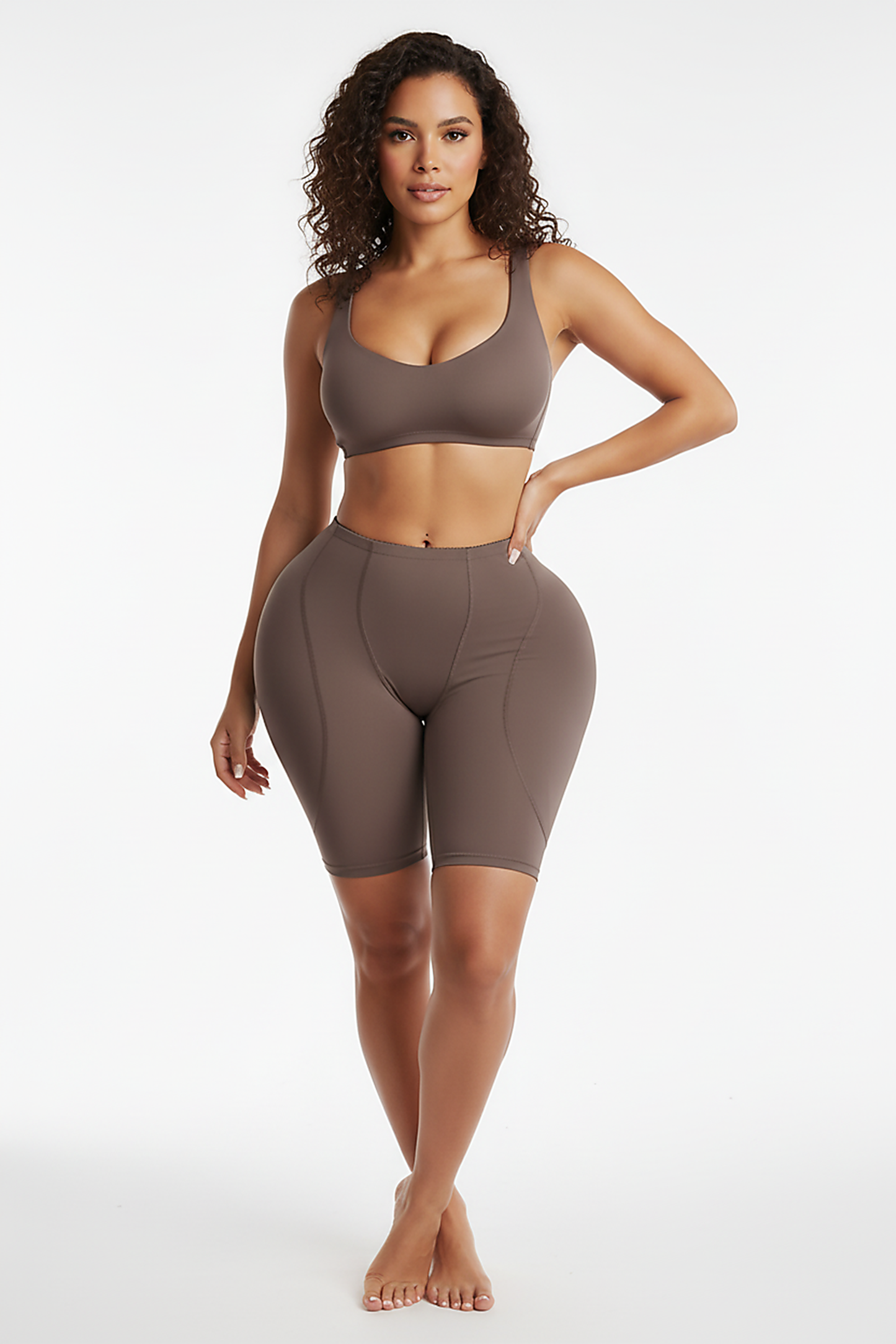 Shapewear butt lifter panties, front view on model.