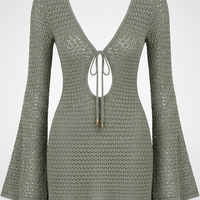 Hollow-out knit short dress, lifestyle shot on model.