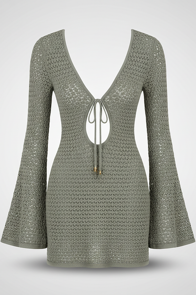 Hollow-out knit short dress, lifestyle shot on model.