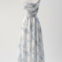 woman wearing floral print maxi dress, front view, standing, hands relaxed