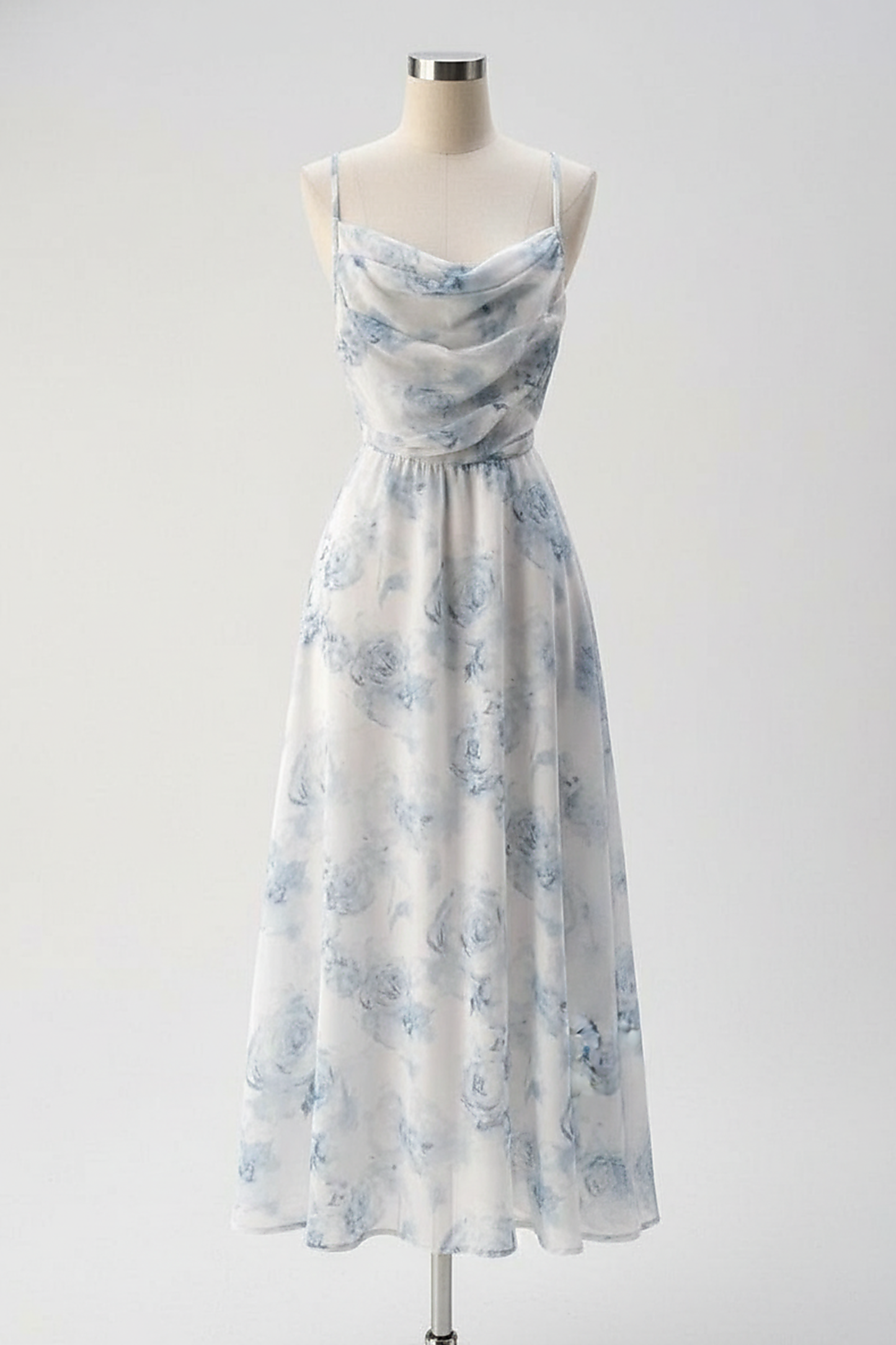 woman wearing floral print maxi dress, front view, standing, hands relaxed