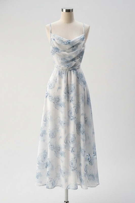 woman wearing floral print maxi dress, front view, standing, hands relaxed