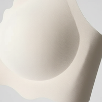 Neutral bralette, close-up fabric detail.