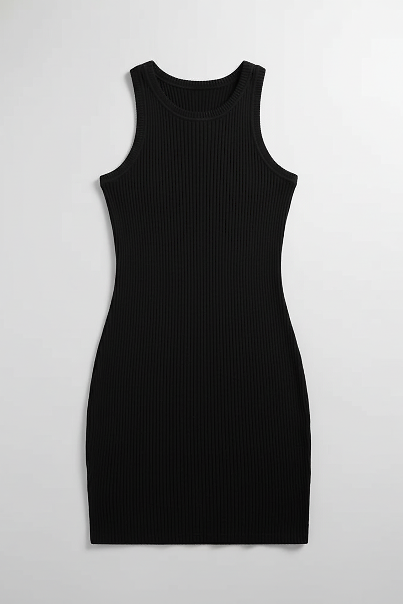 woman wearing black ribbed bodycon mini dress, front view, standing, hands relaxed