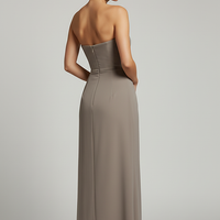 Black backless bodycon maxi dress with high split, back view on model.