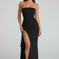 Black strapless backless maxi dress, front view on model.