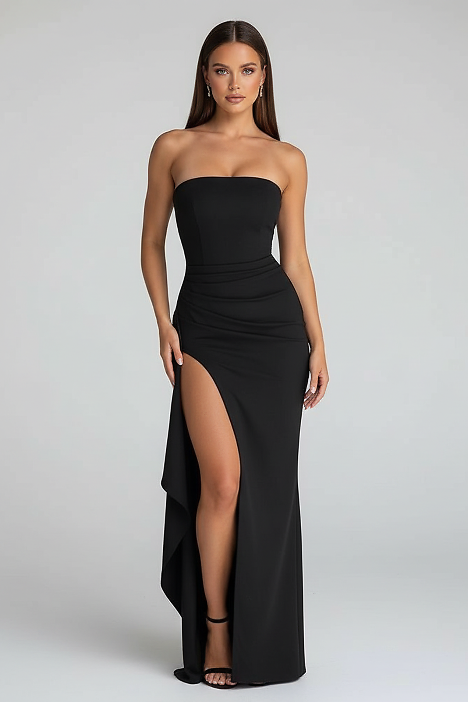 Black strapless backless maxi dress, front view on model.