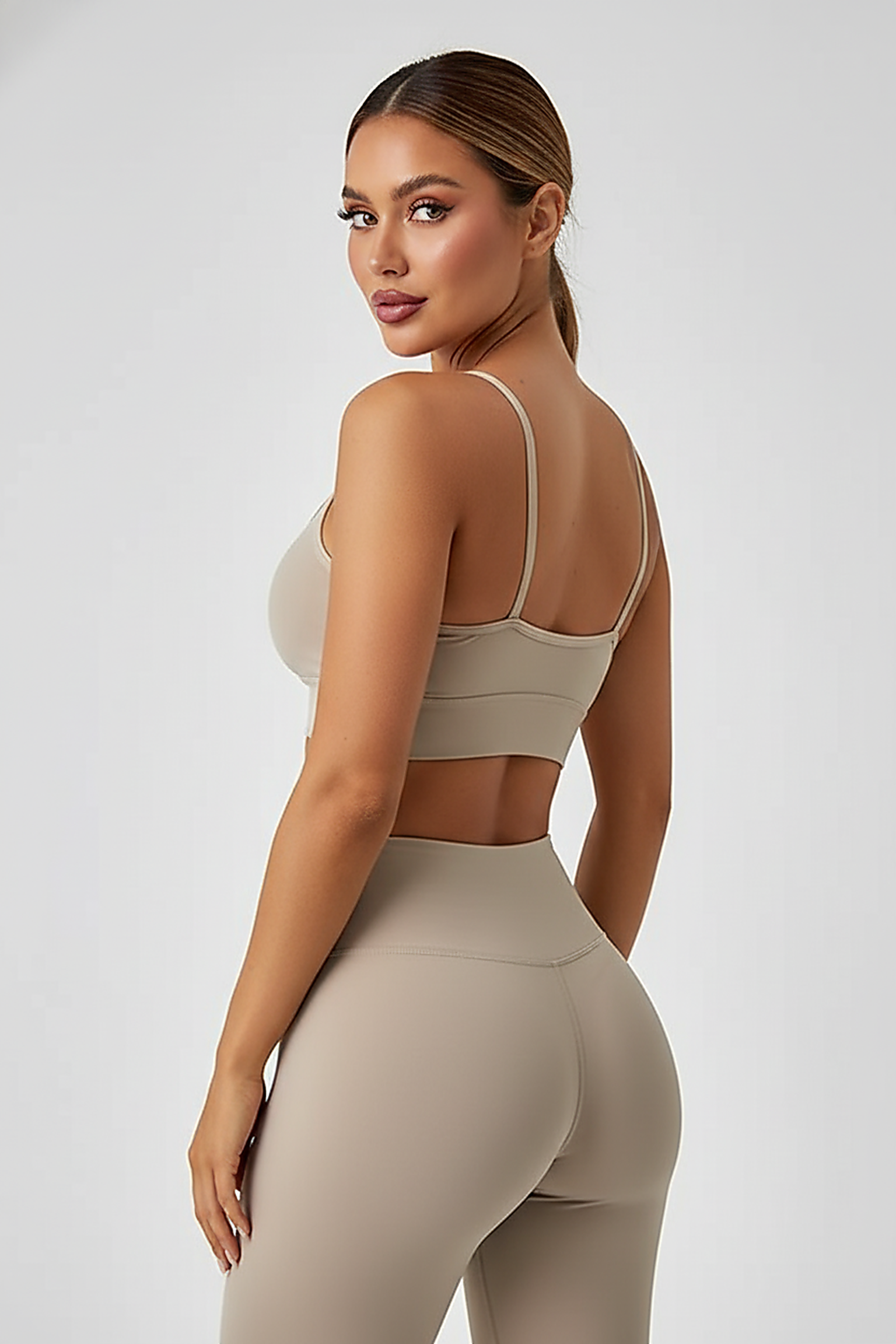 Black yoga fitness sports bra crop top, back view.