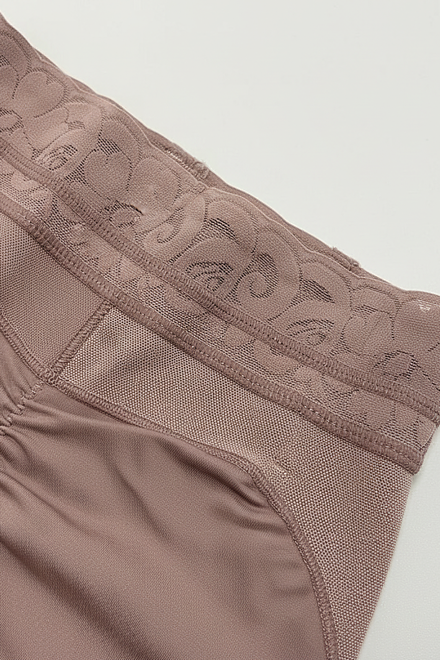 Body shaper tummy control panties fabric detail.