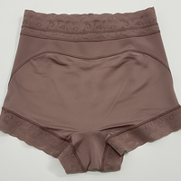 Body shaper tummy control panties front view on model.