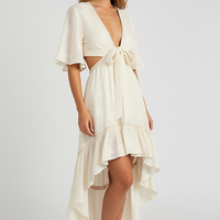 Patterned bohemian short sleeve dress, front view on model.