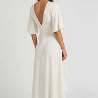 Patterned bohemian short sleeve dress, front view on model.