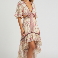 Patterned bohemian short sleeve dress, front view on model.