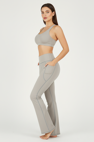 Black bootcut yoga pants, alternate angle view on model.