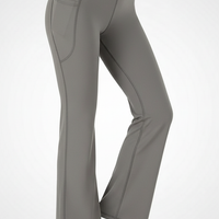 Black bootcut yoga pants, alternate angle view on model.