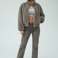 Green faux fur jacket, back view on model.