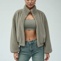 Purple faux fur jacket, front view on model.