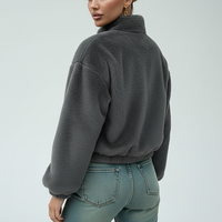 Brown faux fur jacket, front view on model.