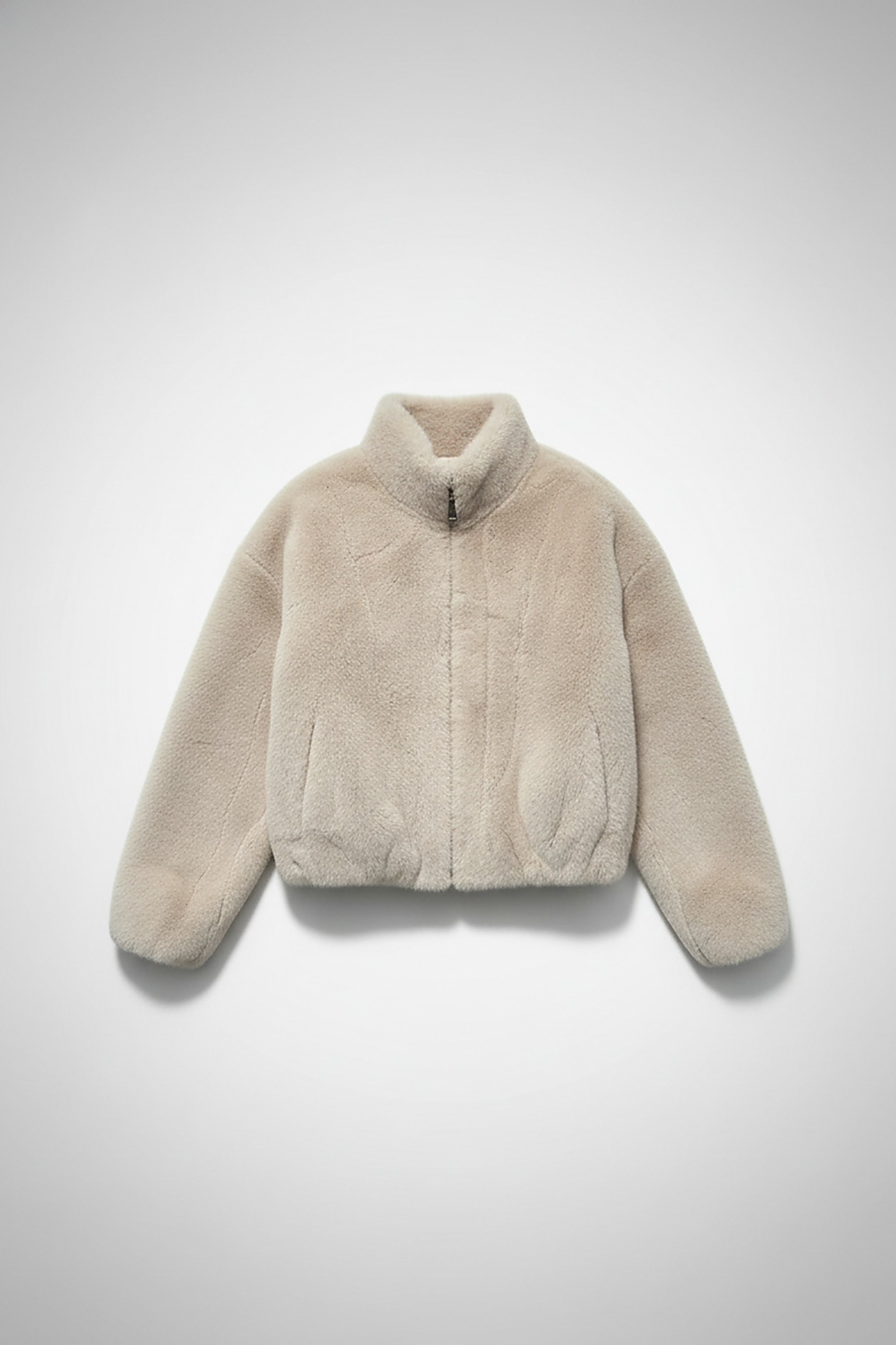 White faux fur jacket, open front view.