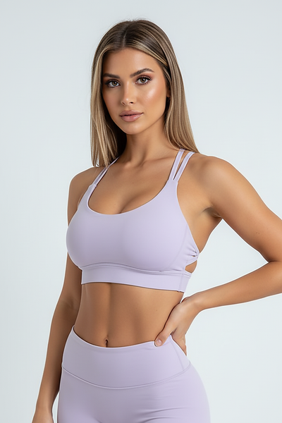 Breathable cross-back sports bra, side view on model.