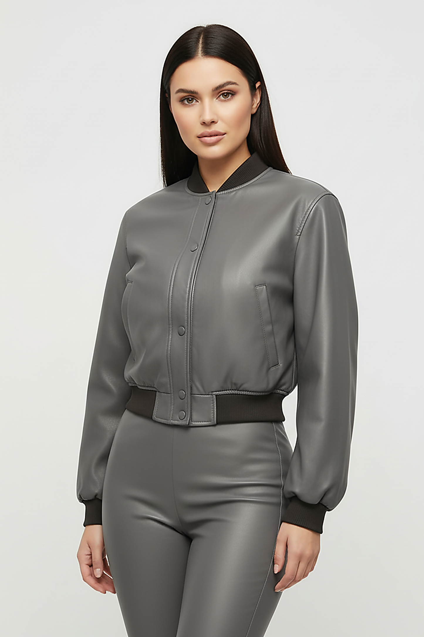 Distressed faux leather bomber jacket, interior lining detail.