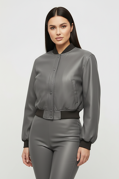 Distressed faux leather bomber jacket, interior lining detail.