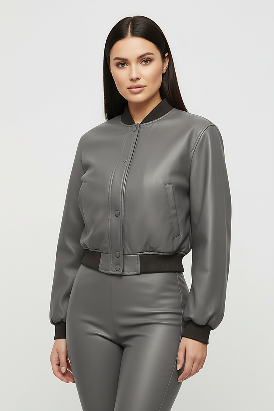 Distressed faux leather bomber jacket, side view on model.