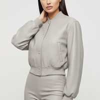 Distressed faux leather bomber jacket, back view on model.