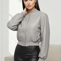 Distressed faux leather jacket, fabric texture detail.