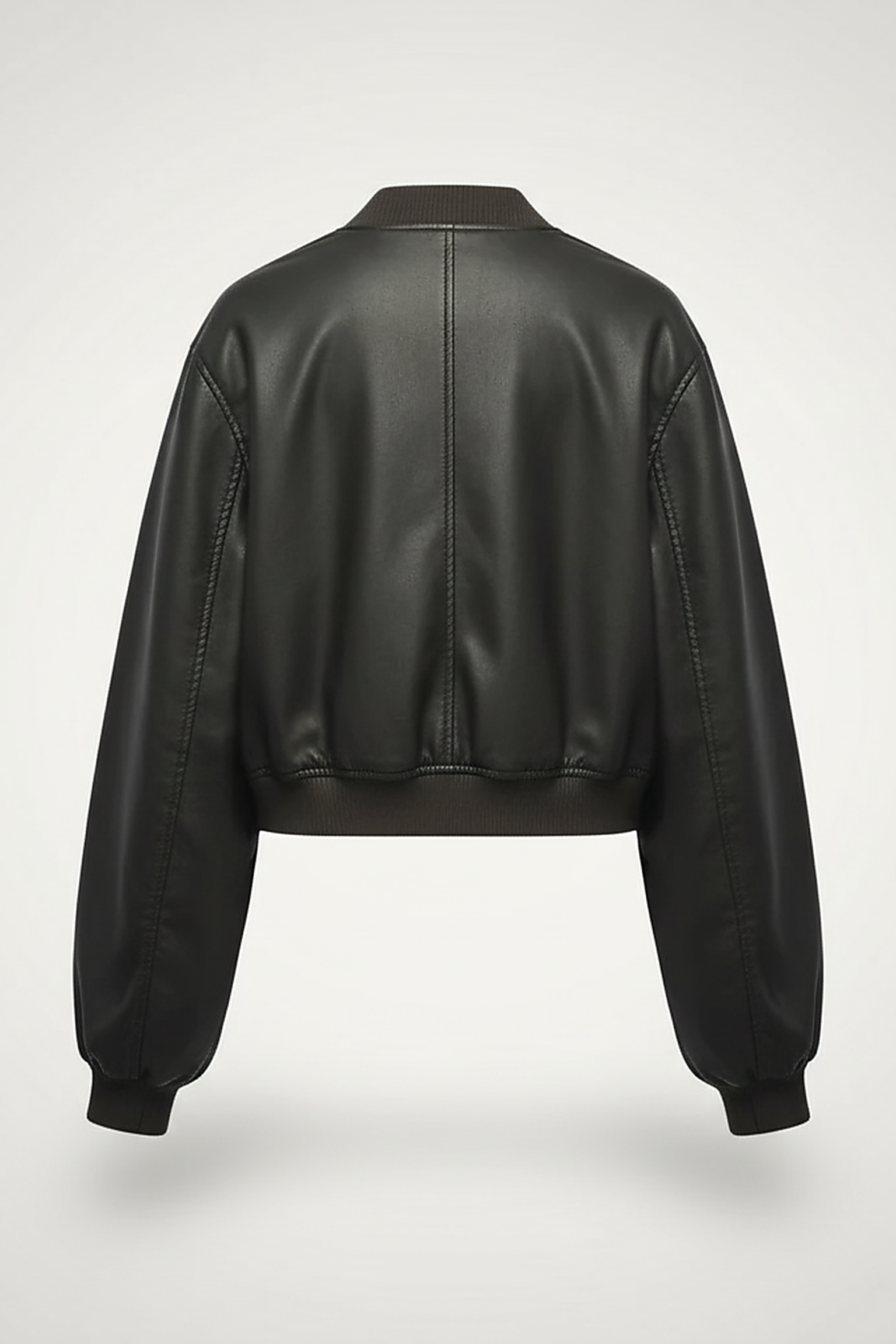 Distressed faux leather bomber jacket, model wearing it casually.