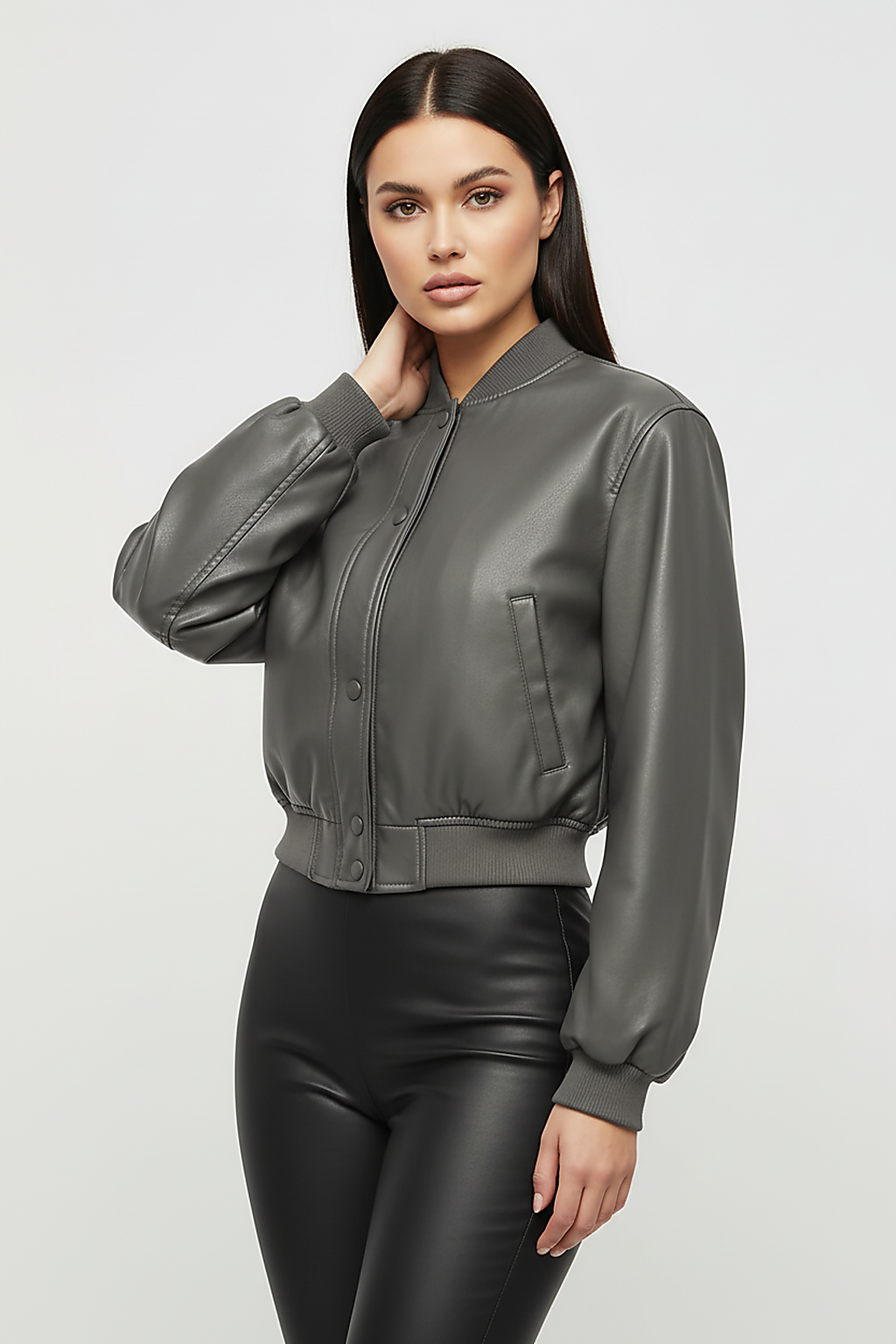 Distressed faux leather bomber jacket, cuff and sleeve detail.