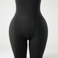 Black shapewear shorts, alternate angle view on model.