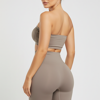 Black shapewear shorts, back view on model.