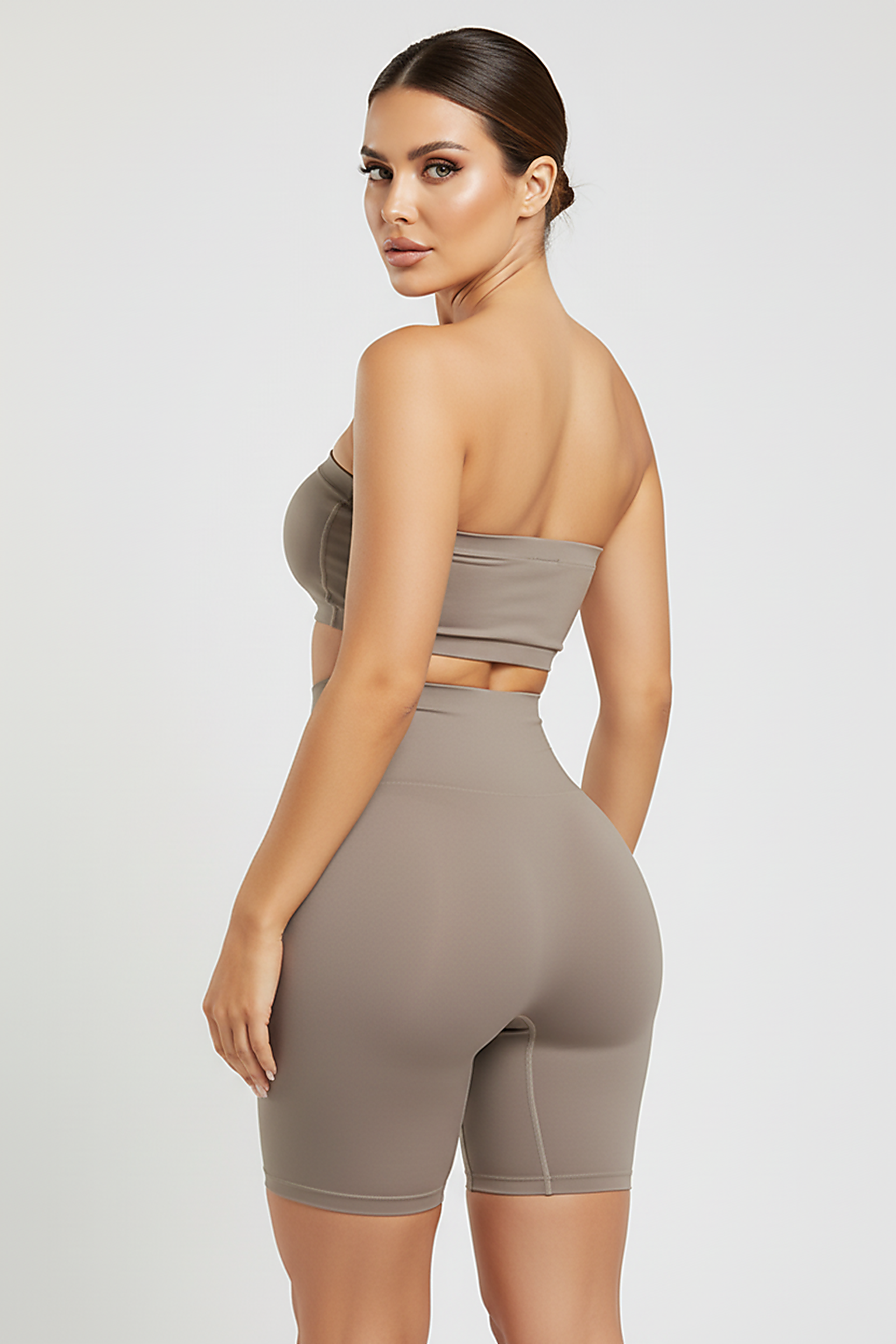 Black shapewear shorts, back view on model.