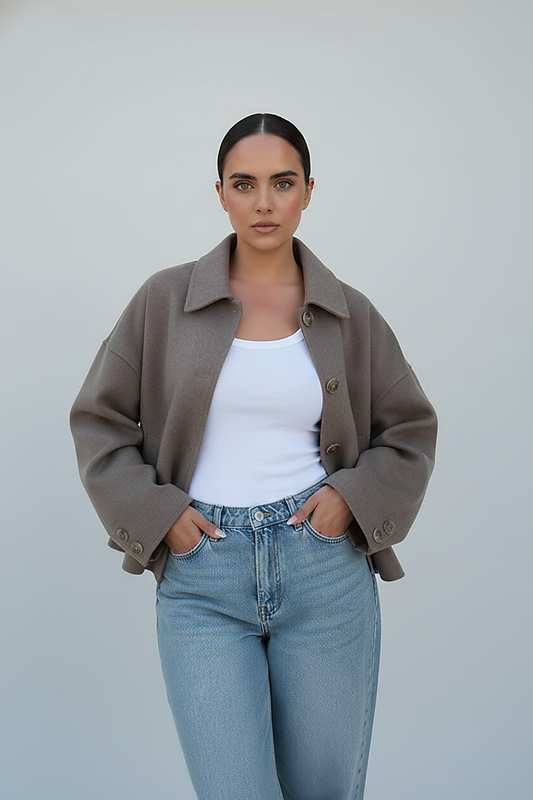 Women's solid wool jacket, back view on model.