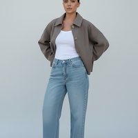 Women's solid wool jacket, side view on model.