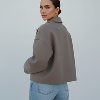 Solid wool jacket, close-up of lapel and collar.