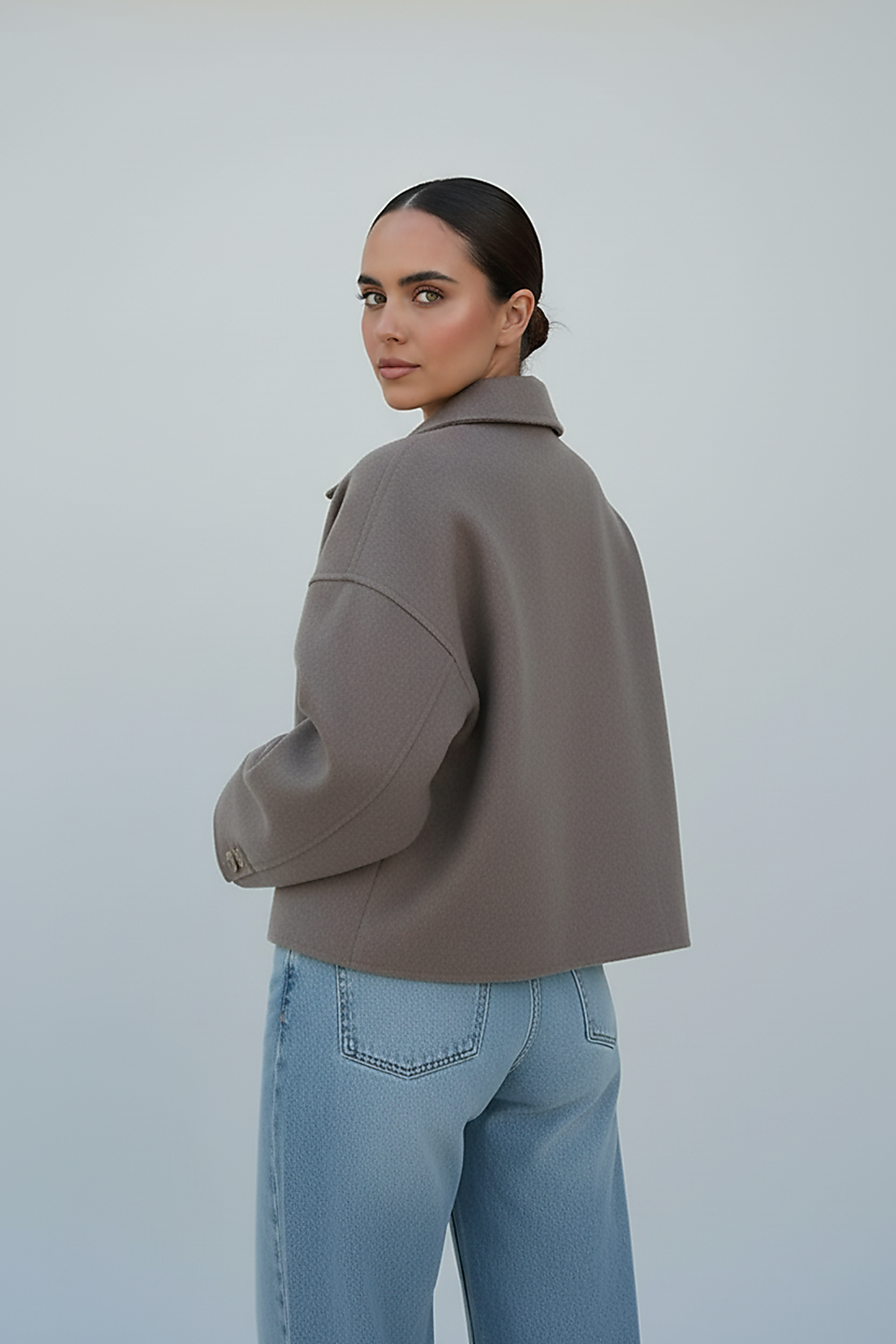 Solid wool jacket, close-up of lapel and collar.