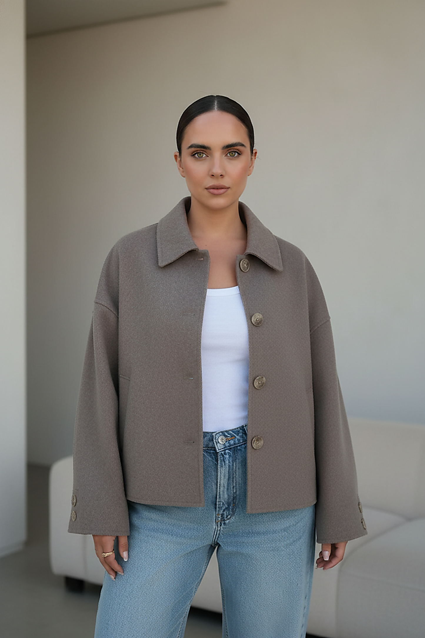 Solid wool jacket, close-up of sleeve and cuff.