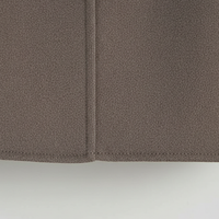 Women's solid wool jacket, styled with accessories.