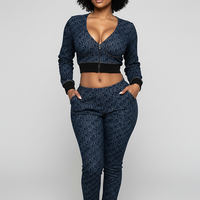 Women's blue denim jacket, back view on model.