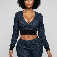 Women's blue denim jacket, side view on model.