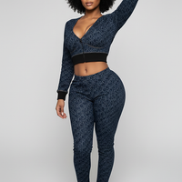 Women's blue denim jacket, pocket detail.