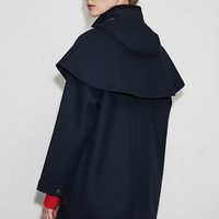 Removable hooded coat, close-up of pockets and zipper.