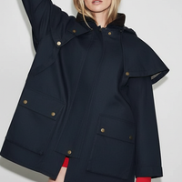 Removable hooded coat, front view on model.