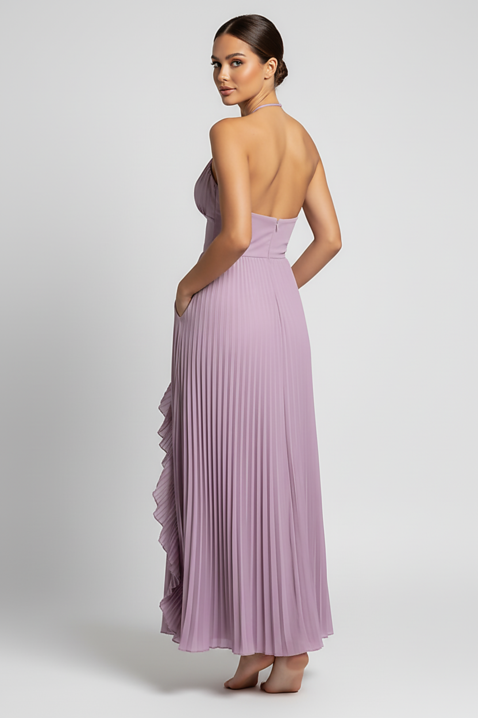 Elegant lotus edge sleeveless party robe, front view on model.