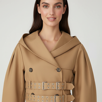 Black hooded crop trench coat, interior lining detail.