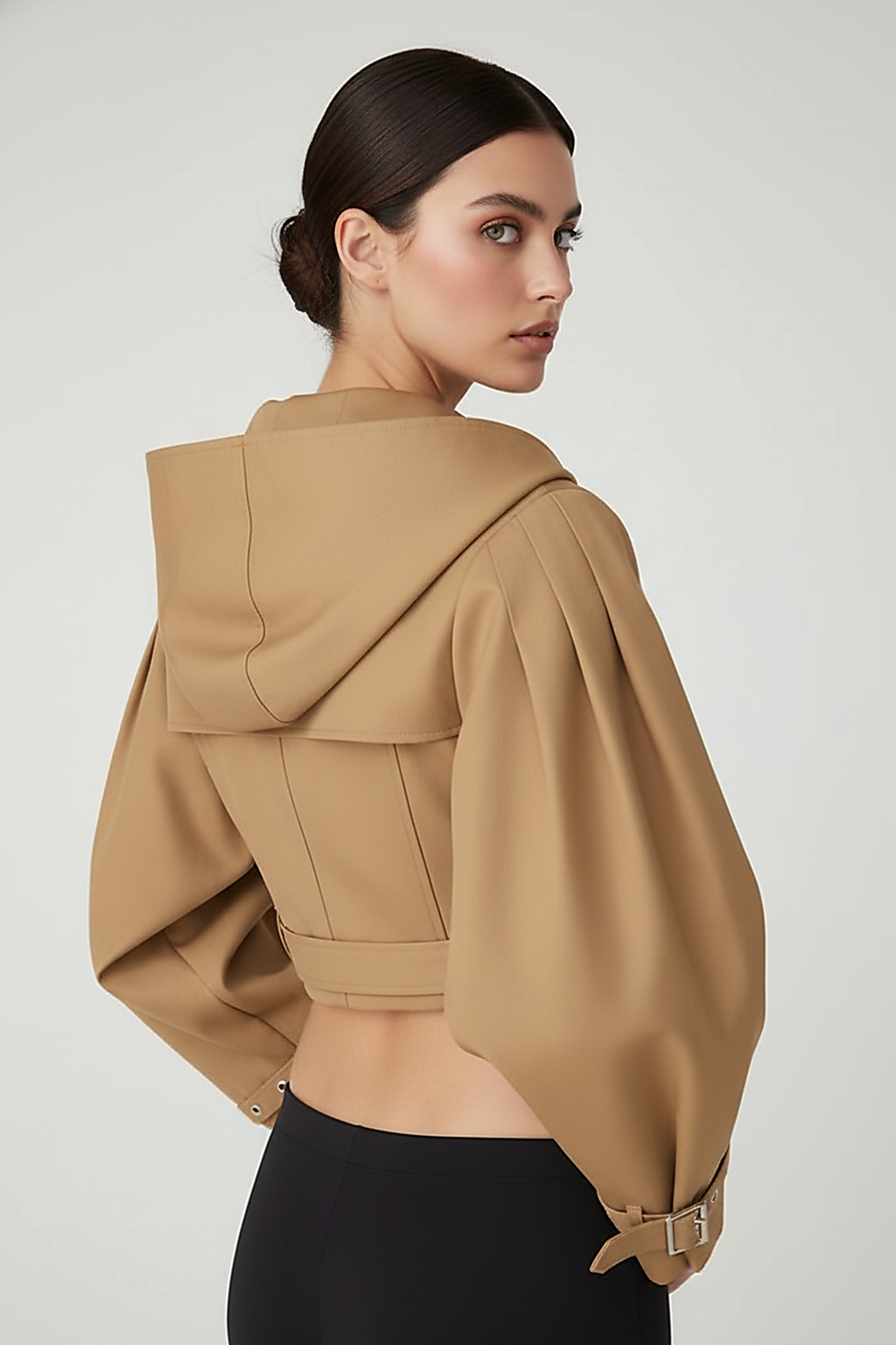 Black hooded crop trench coat, front view, open.