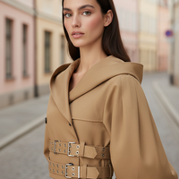 Black hooded crop trench coat, fabric texture detail.