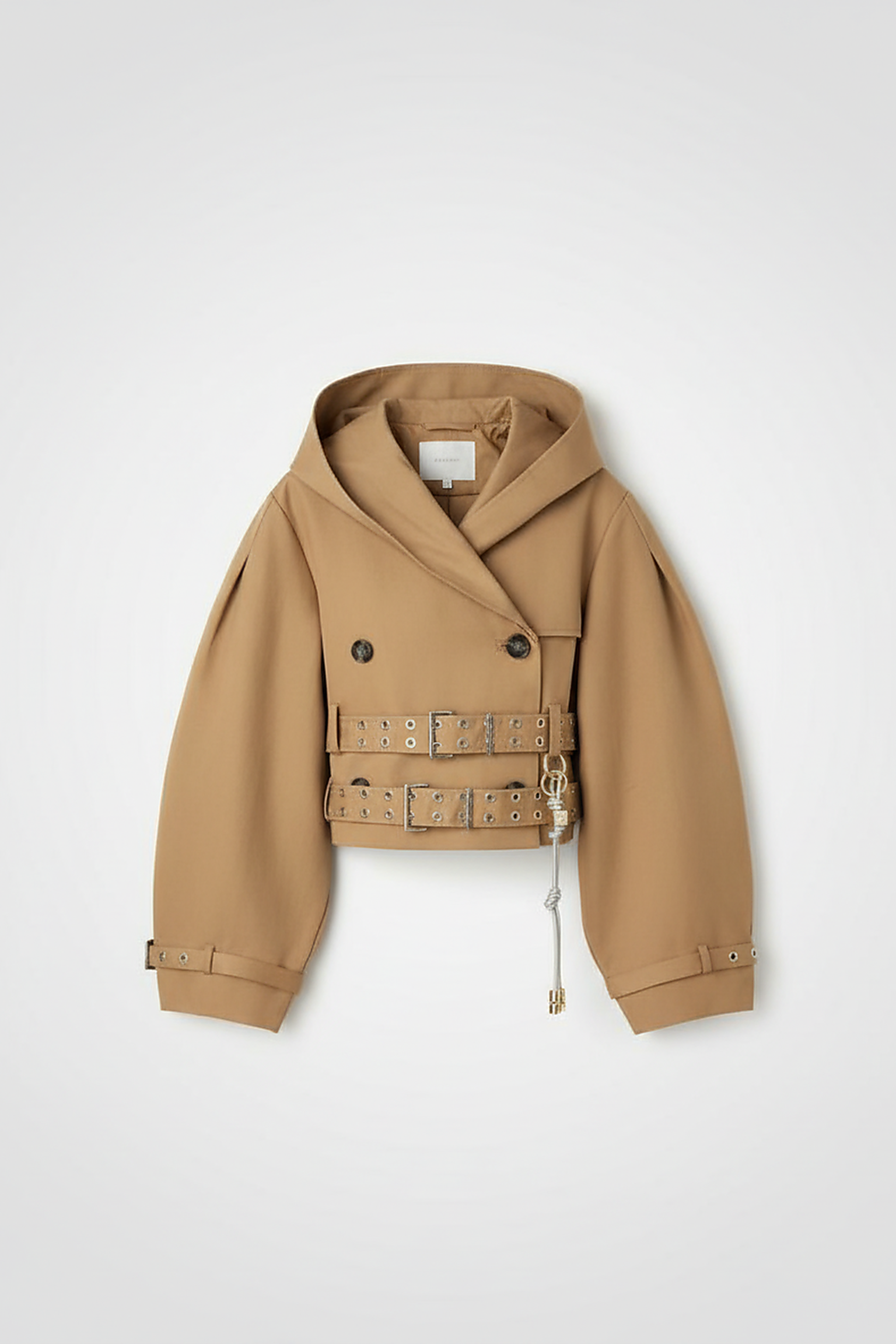 Black hooded crop trench coat, close-up of lapel.